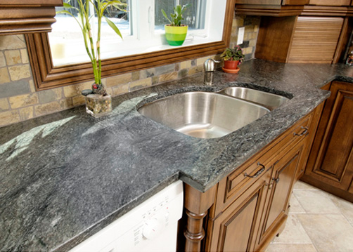 Soapstone countertops with a hole for conventional sink